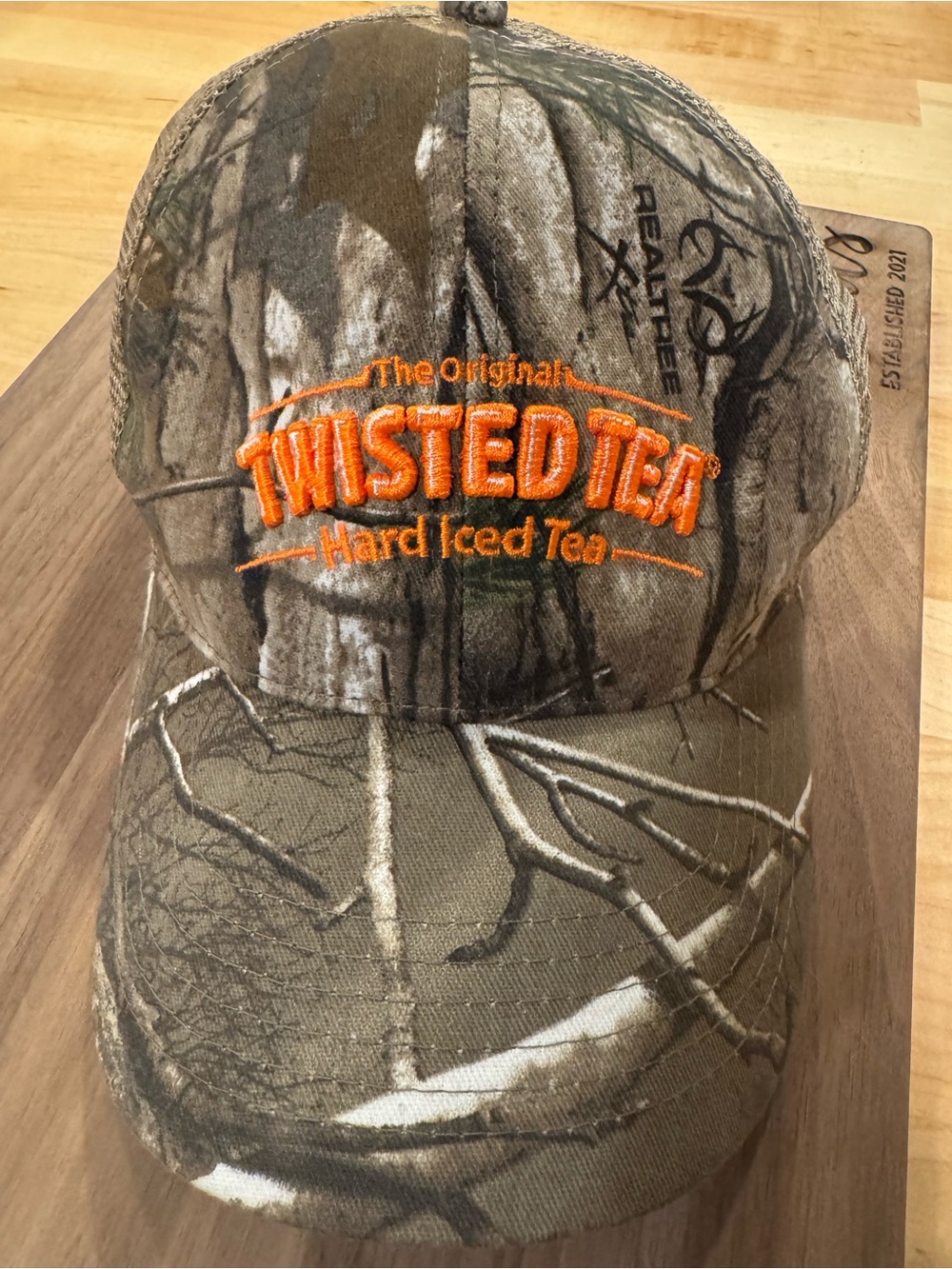 Realtree Camo Twisted Tea Baseball Cap with Orange Logo